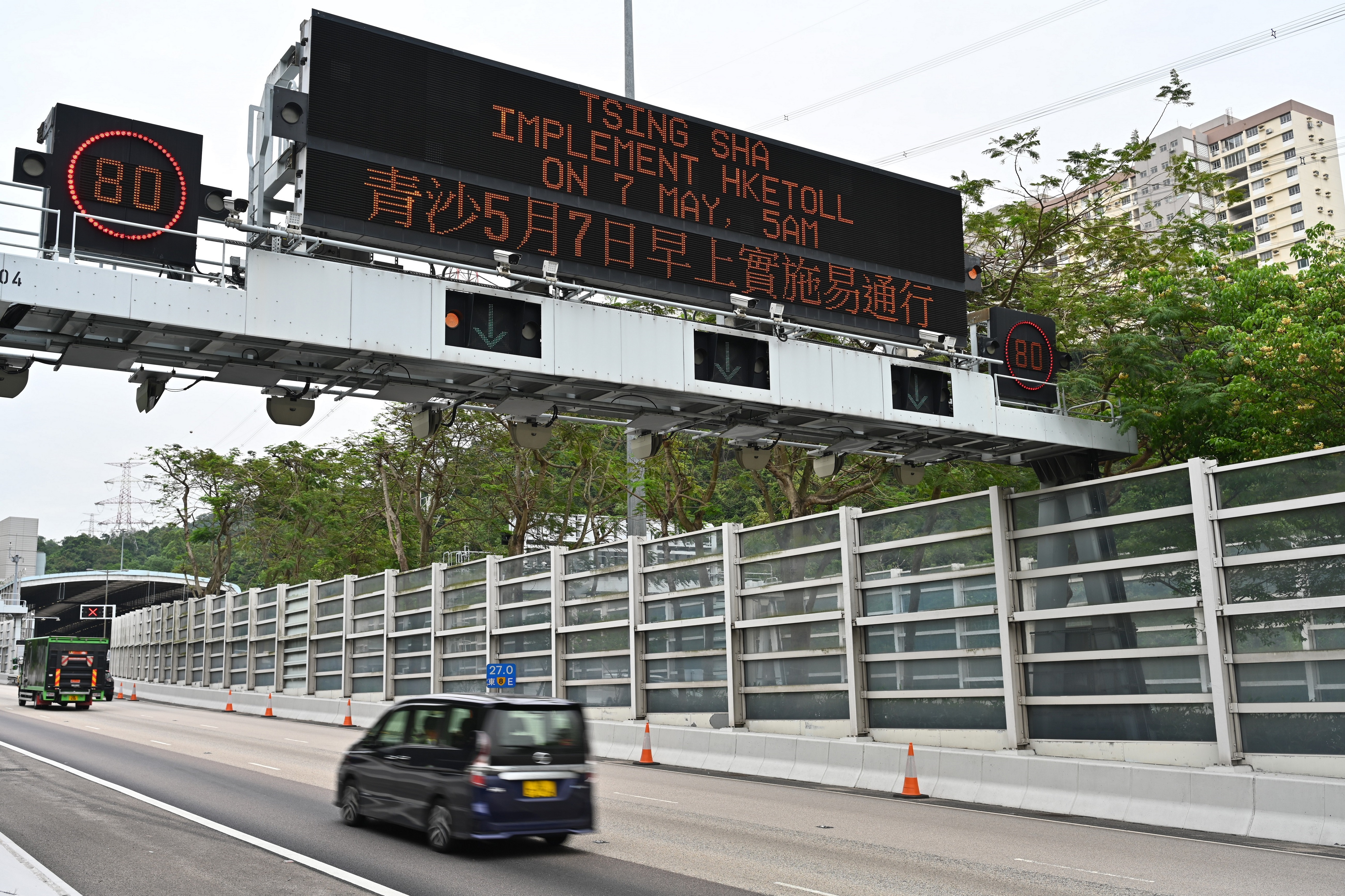 The Transport Department reminded the public today (April 26) that the HKeToll, a free-flow tolling service, will be implemented in the Tsing Sha Control Area (Eagle's Nest Tunnel, Sha Tin Heights Tunnel and Tai Wai Tunnel) from 5am on May 7. Photo shows the system in the Tsing Sha Control Area. The use of a tolled tunnel by a motor vehicle will be detected by the field equipment through reading a toll tag affixed on the windscreen of the vehicle or by capturing the image of the vehicle's number plate, and recognising the vehicle registration mark automatically. Tunnel tolls will be deducted from the pre-set toll payment account in the system, and the user will be notified.